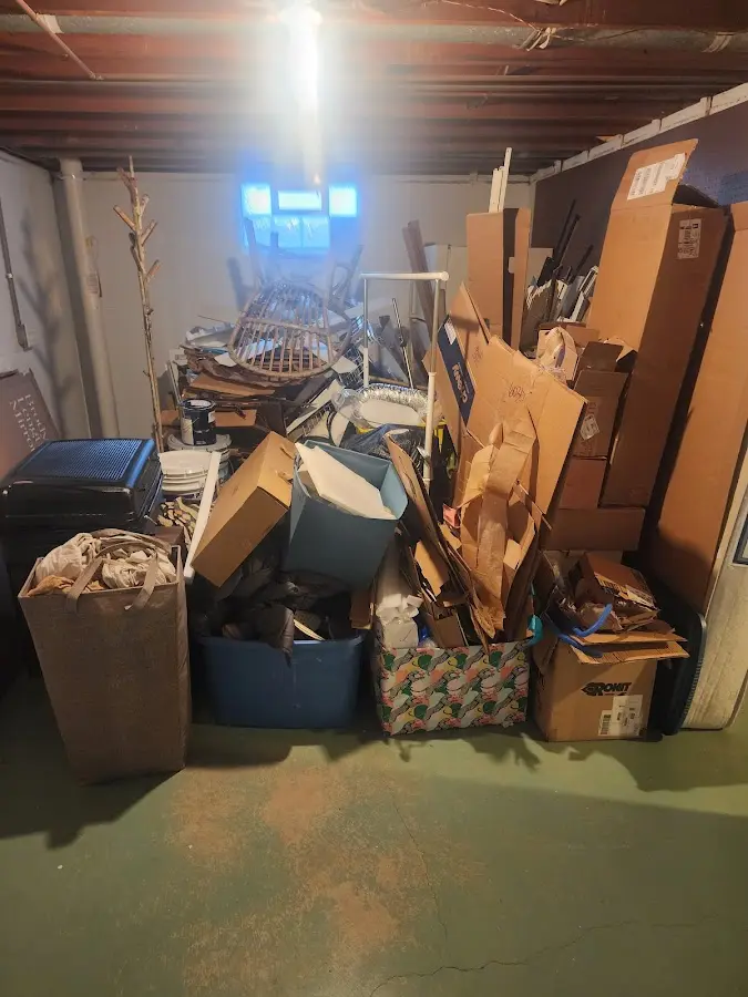 Roll-off dumpster container at job site for 40 Yard Dumpster Rental in Limington